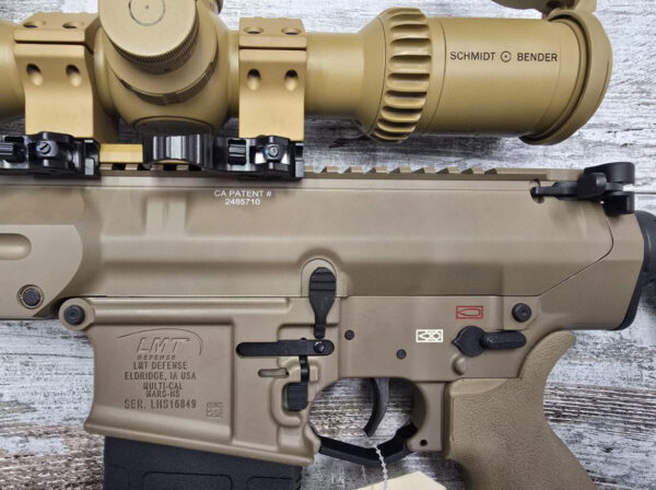 IMG_9025 Carabine LMT STGW-20 cal. .308 Win +Lunette S&B 5-20*50 PM II Ultra Short LPI P4FL + Montage ERA-Tac UltraShort Carabine LMT STGW-20 + Lunette S&B 5- 20×50 PM II Ultra Short LPI P4FL + Montage ERATac UltraShort Calibre : .308 Winchester Prix : 9'950,- CHF (au lieu de 11'110, - CHF) Offre : Bipied Harris offert Disponibilité : Pièce rare - quantité extrêmement limitée • Marque : LMT (Lewis Machine & Tool) • Modèle : STGW-20 • Calibre : .308 Win (7.62x51 NATO compatible selon configuration) • Optique incluse : Schmidt & Bender 5-20x50 PM II Ultra Short LPI P4FL (optique d'origine) • Montage optique: ERATac UltraShort (origine, montage spécifique) • Accessoires inclus: Bipied Harris (offert) • Particularités : Lunette et montage originaux — carabine conforme à la spécification DRA10 • État : Neuf / comme neuf